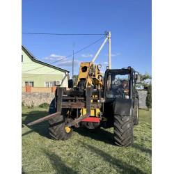 Телескопічний навантажувач CAT TH 406